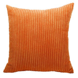 Coussin orange en velours